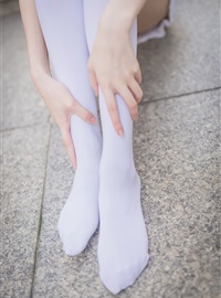 Rabbit plays with painted white stockings over the knee(36)